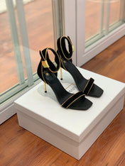 BALMAIN 25S UMA HEELED SANDALS 105MM IN BLACK SUEDE GOLD HARDWARE