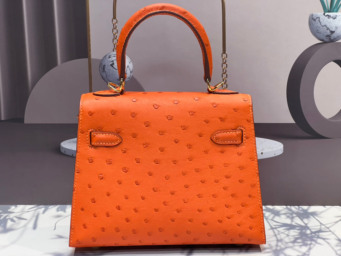KELLY BAG 20 IN FIRE ORANGE OSTRICH LEATHER WITH GOLD HARDWARE