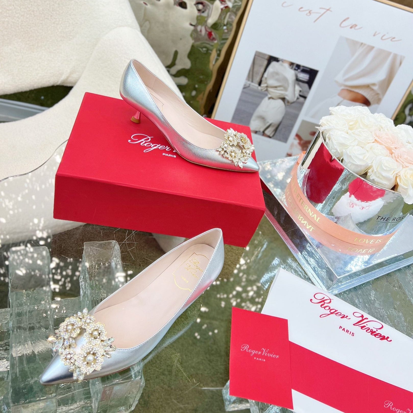 EFFLORESCENCE POINTED-TOE PUMPS IN SILVER SATIN WITH CRYSTAL BUCKLE