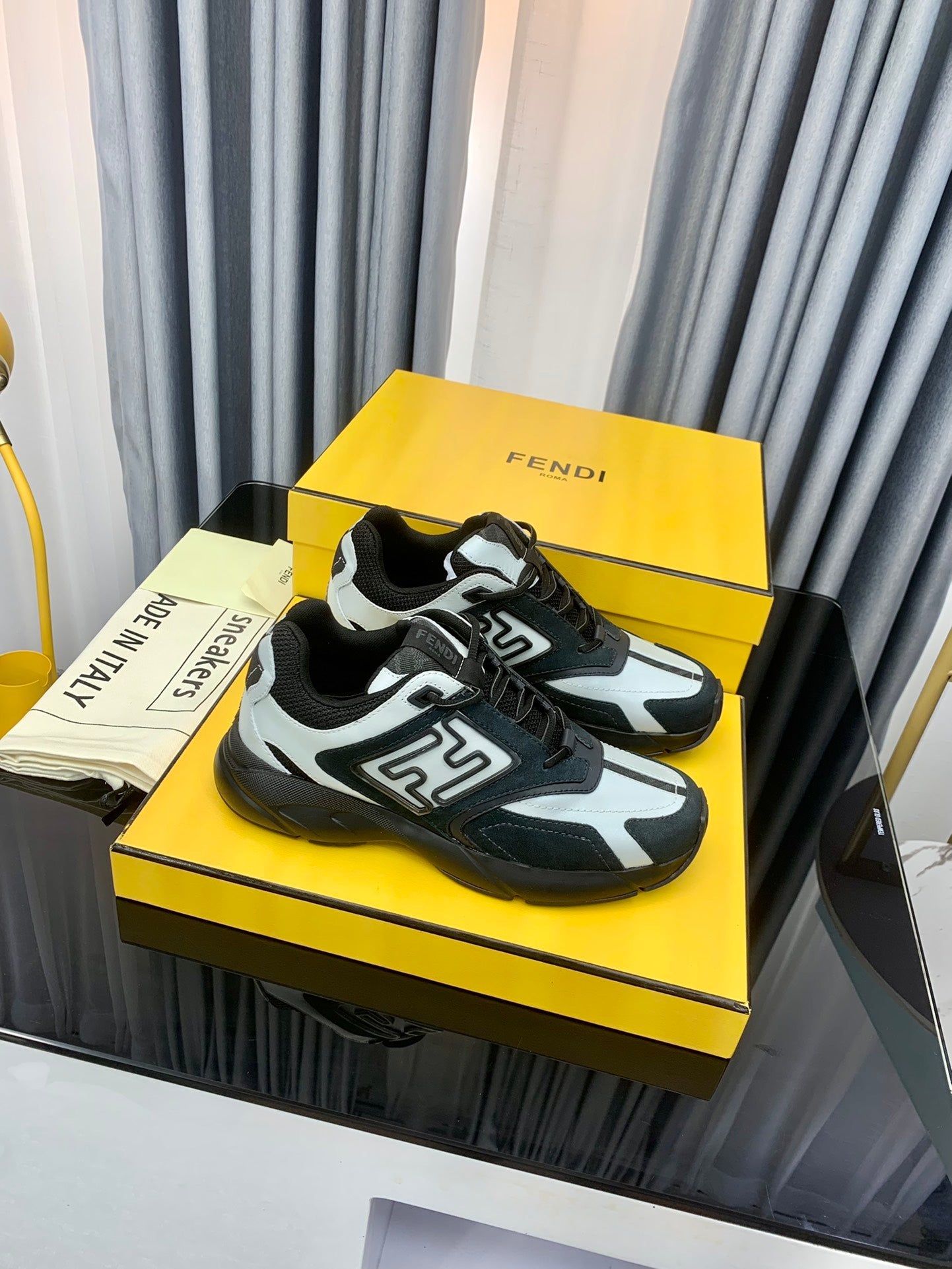 FENDI FASTER TRAINER IN BLACK SUEDE MIX WHITE CALFSKIN