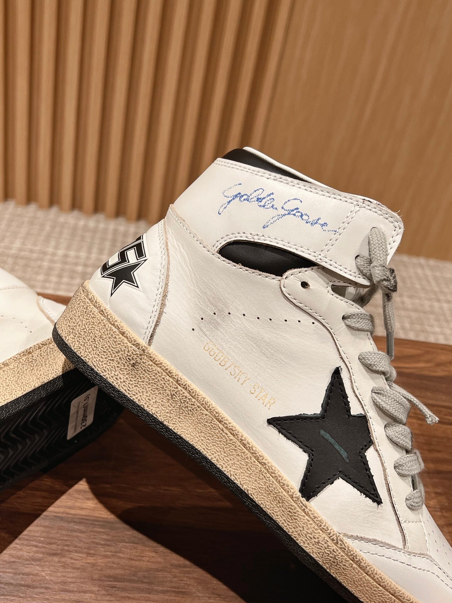 SKY-STAR SNEAKERS IN WHITE NAPPA LAMBSKIN WITH BLACK STAR AND HEEL TAB