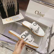 CHLOÉ WOODY SLIPPER IN WHITE MIX BLACK CANVAS