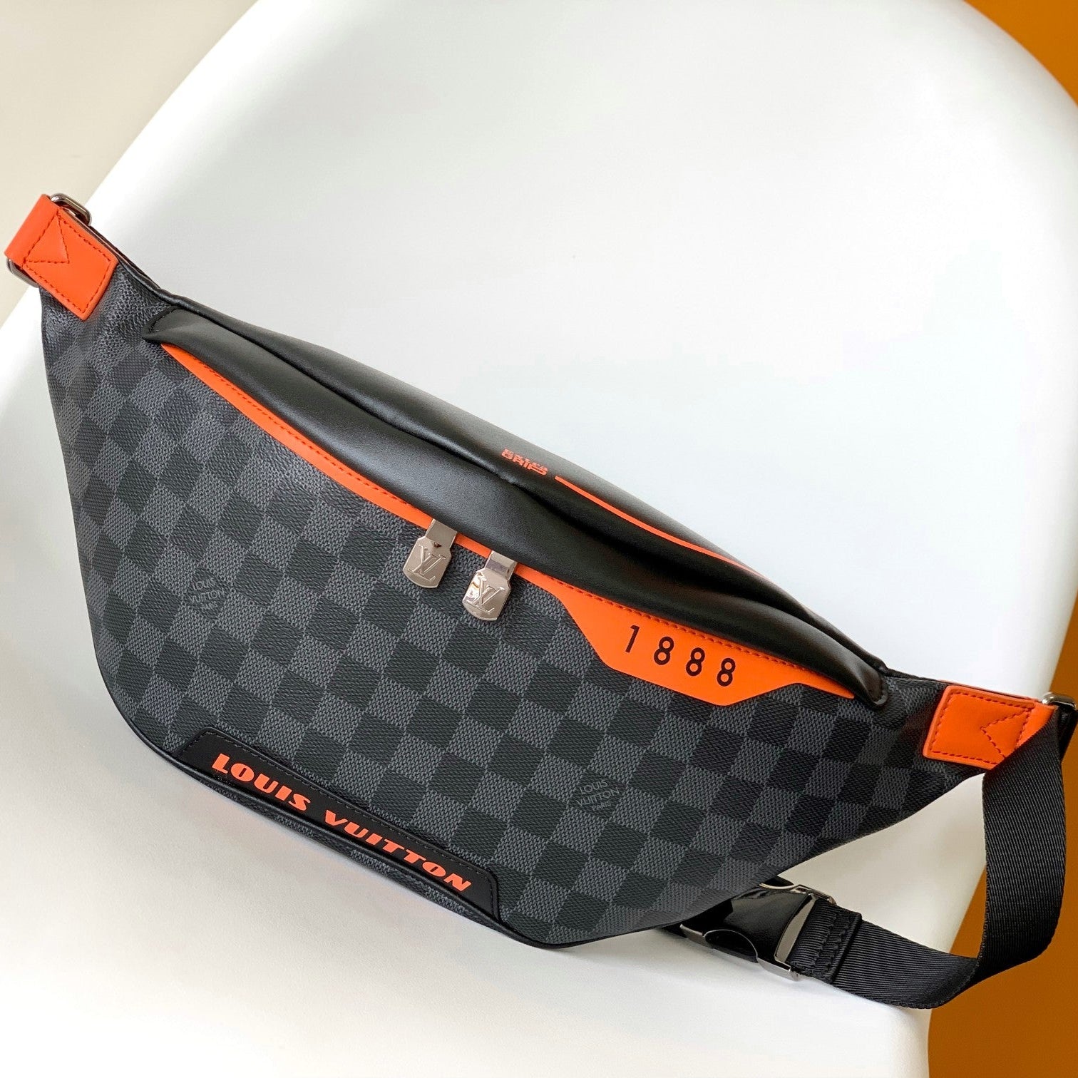 LV 25S BUMBAG 37 IN BLACK AND ORANGE COATED MONOGRAM CALFSKIN