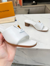 LV 26S CAPRI HIGH-HEELED MULES IN WHITE CALFSKIN