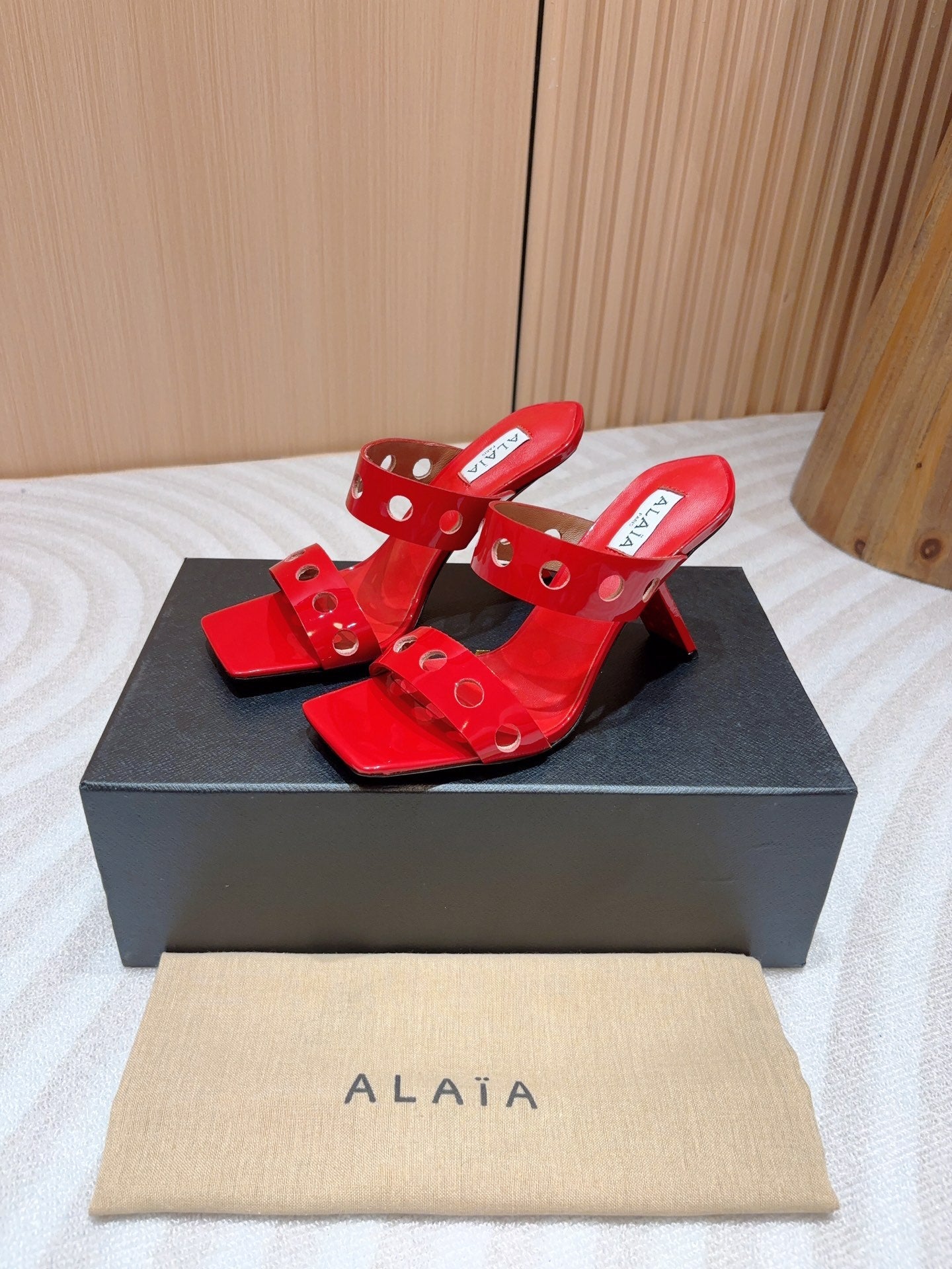 ALAIA TWO-STRAPS HIGH HEEL SANDALS IN CHERRY RED PATENT LAMBSKIN