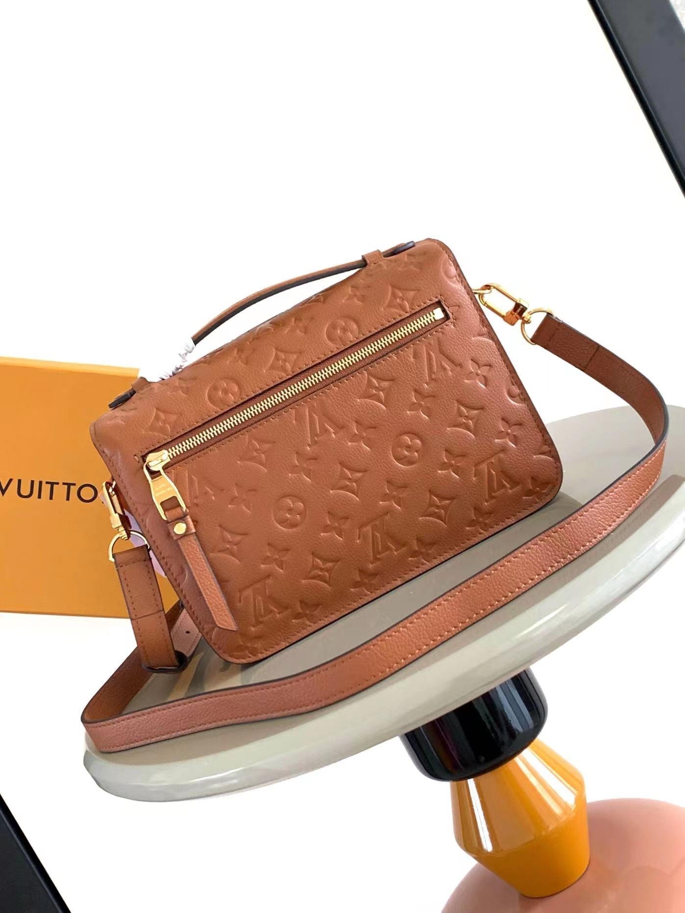 POCHETTE MÉTIS 25 IN COGNAC MONOGRAM EMPREINTE LEATHER GOLD HARDWARE
