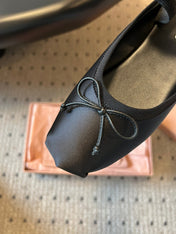 MIUMIU 26S BALLET MULES IN BLACK SATIN WITH BOW