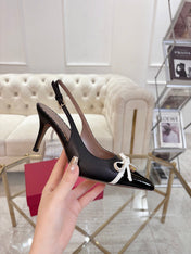 GARAVANI POINTED SLINGBACK PUMPS IN BLACK CALFSKIN
