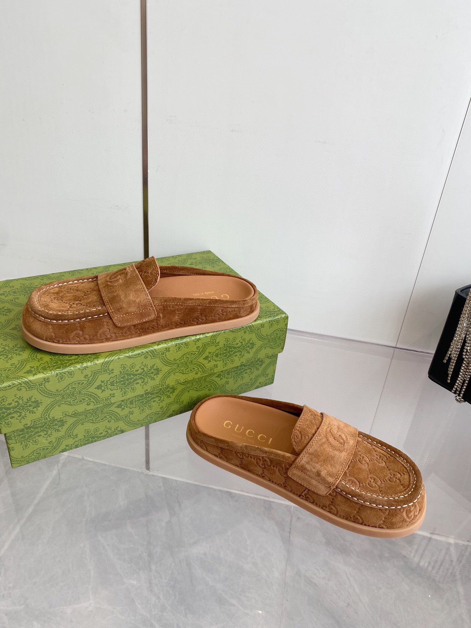 GG LOAFERS IN BROWN MONOGRAM EMBOSSED SUEDE