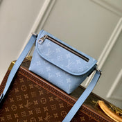 PULSE MESSENGER 22.5 IN BLUE MONOGRAM COATED CANVAS AND CALFSKIN