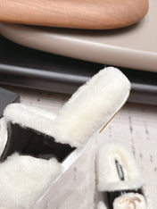 CHANEL 26S SLIDE SANDALS IN WHITE SHEARLING AND BLACK STRAP
