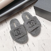 CHANEL 26S SLIDE MULES IN GREY SHEARLING AND BLACK CC LOGO