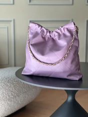CHANEL 26S 22 BAG 42 IN PURPLE QUILTED SHINY CALFSKIN