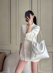 CHANEL 26S 22 BAG 42 IN CREAM WHITE QUILTED SHINY CALFSKIN