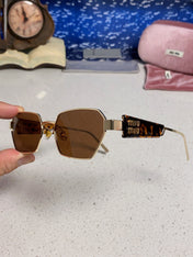MIUMIU 26S SQUARE FRAME IN METAL 443523