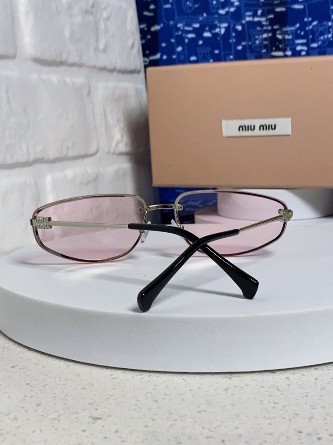 MIUMIU 26S RECTANGULAR FRAME IN METAL 426397