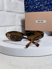 MIUMIU 26S CAT EYE FRAME IN ACETATE 411947