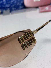MIUMIU 26S SHIELD FRAME IN METAL 436118