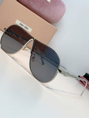 MIUMIU 26S OVAL FRAMEAVIATOR FRAME IN METAL 424526
