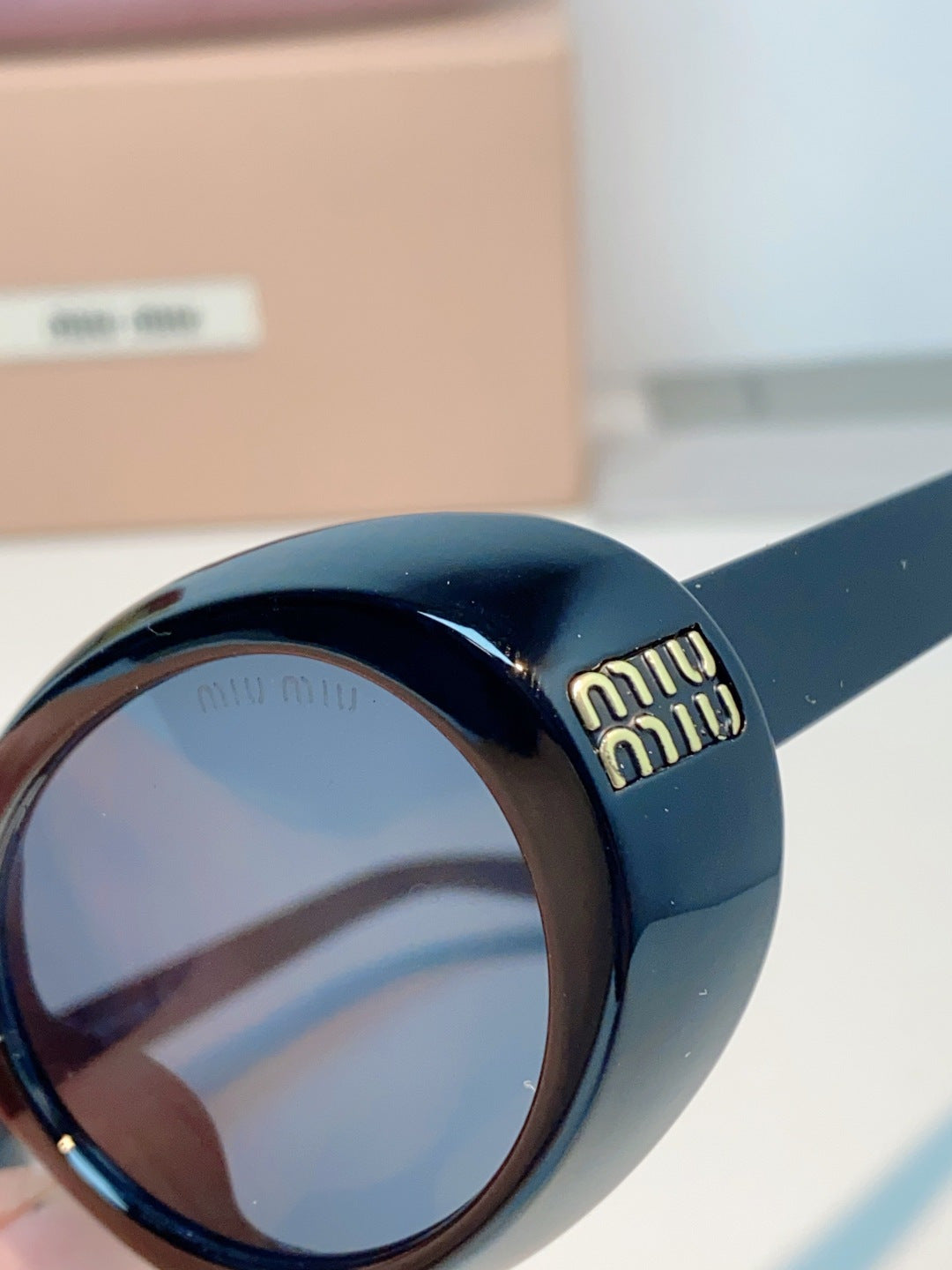 MIUMIU 26S OVAL FRAME IN ACETATE 424533