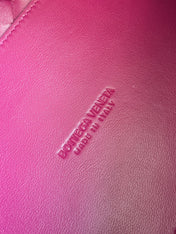 BOTTEGA VENETA 25S SMALL PARACHUTE 29 IN RASPBERRY PINK CALFSKIN GOLD HARDWARE
