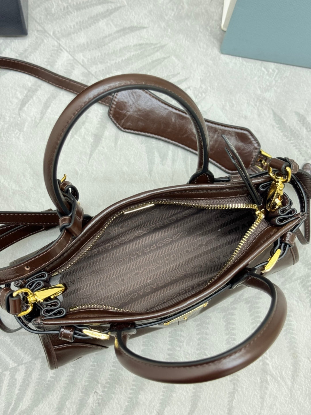PRADA 25S BONNIE MINI HANDBAG 23 IN DARK BROWN CALFSKIN GOLD HARDWARE