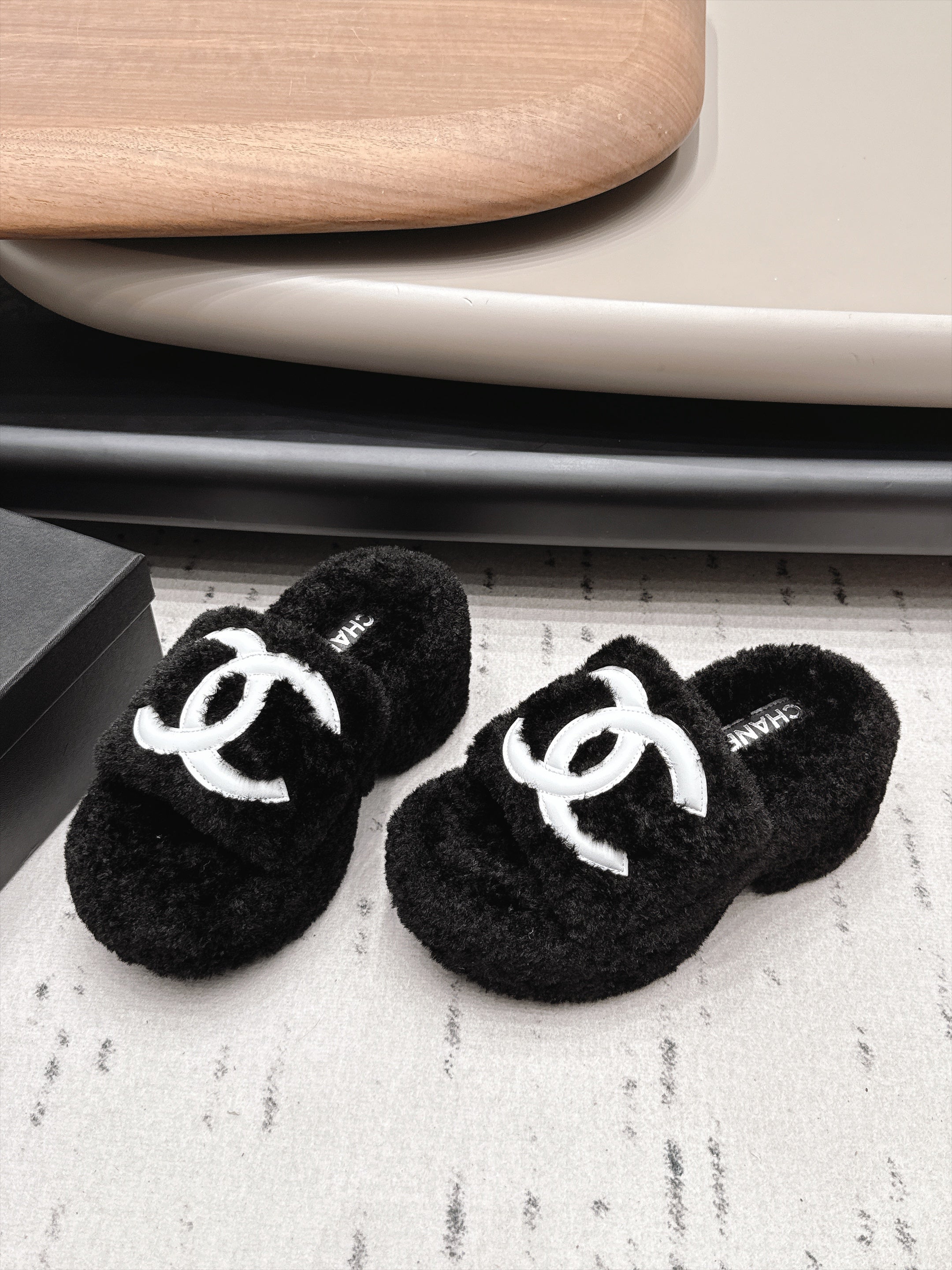 CHANEL 26S HIGH HEEL MULES IN BLACK SHEARLING
