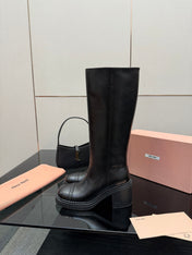 MIUMIU 25S KNEE-HIGH BOOTS IN BLACK CALFSKIN