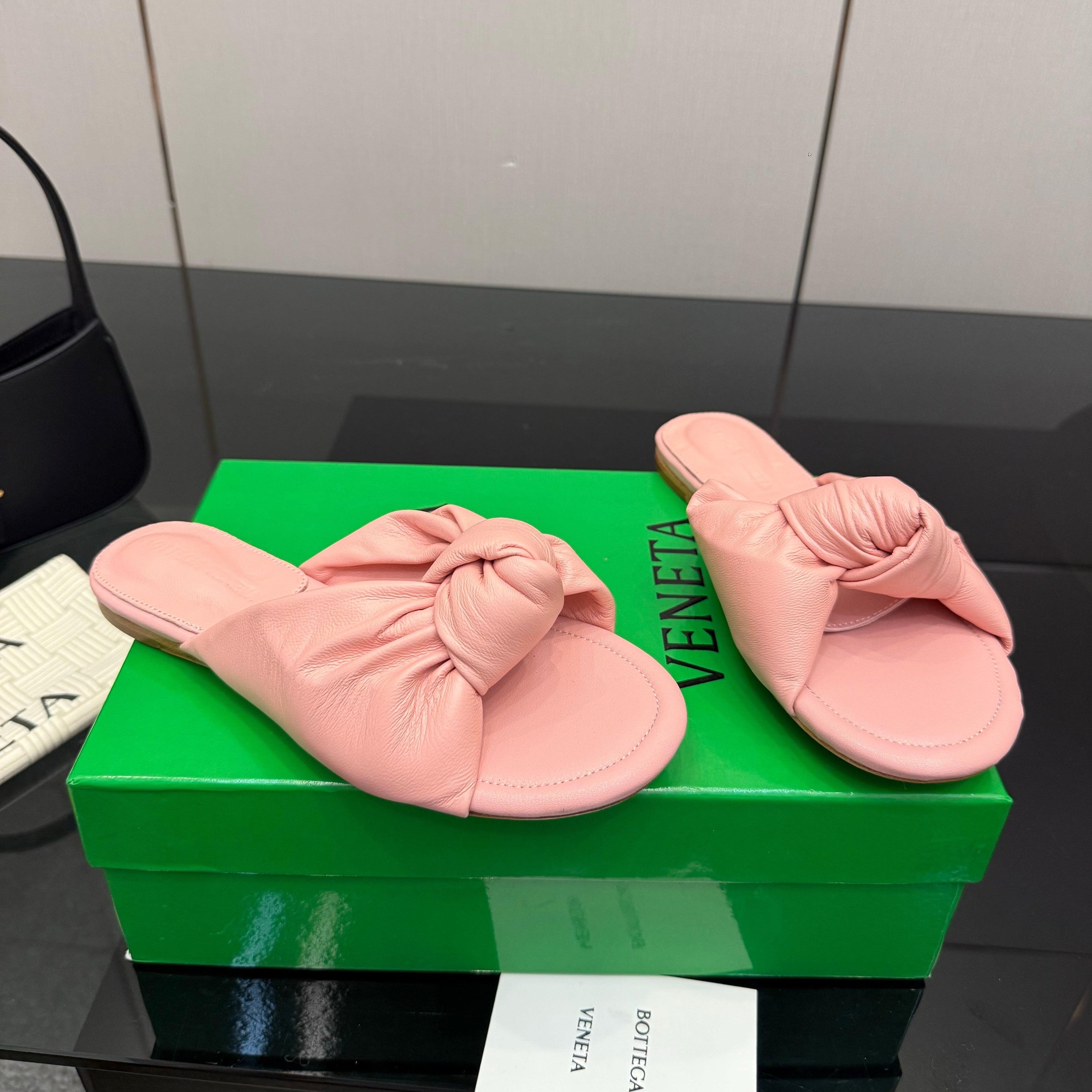 BOTTEGA VENETA 26S SLIDE SANDALS IN PASTEL PINK LAMBSKIN