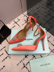 AQUAZZURA 26S POINTED-TOE PUMPS 105 MM IN LIGHT ORANGE SATIN