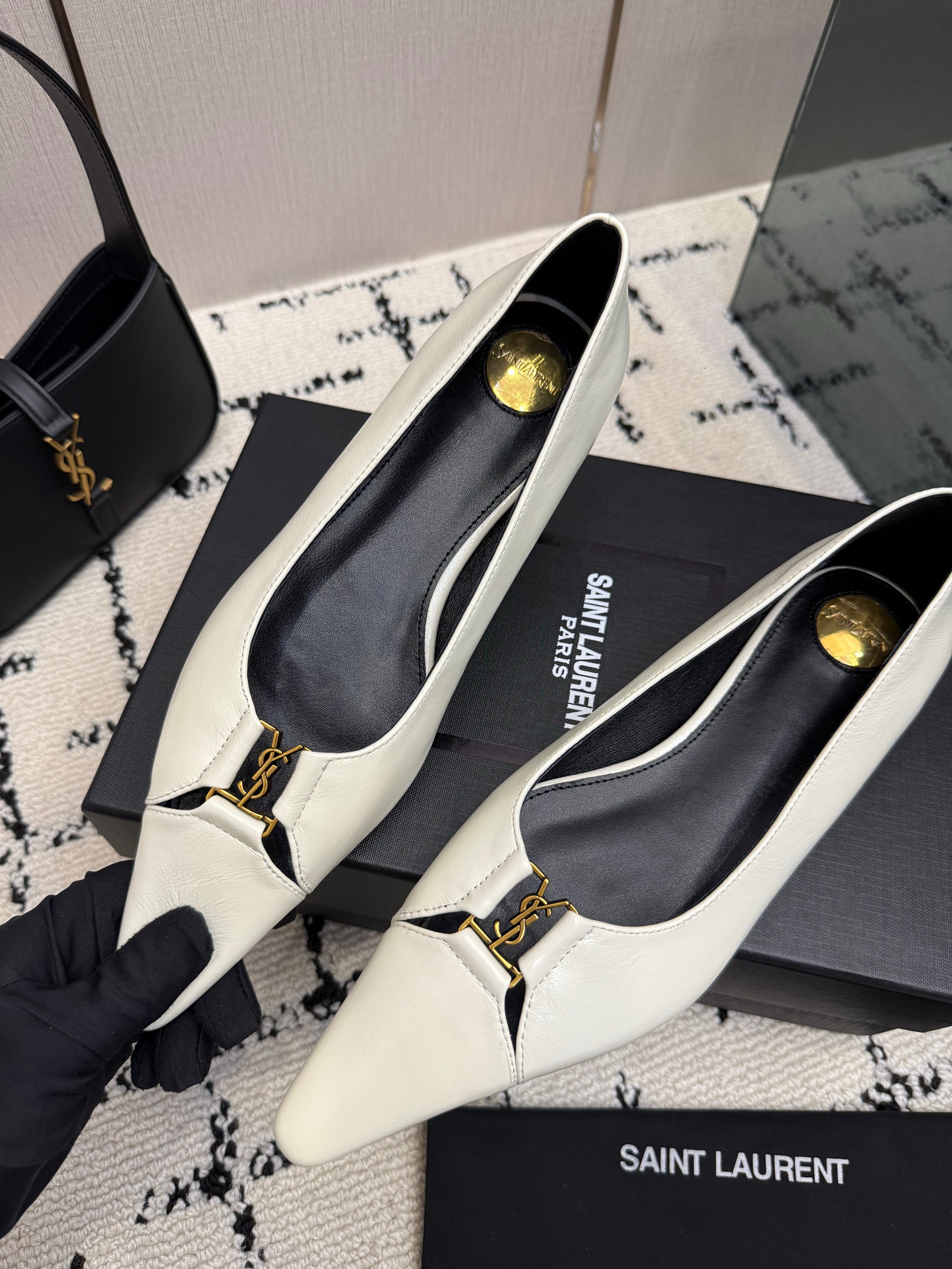 YSL 26S POINTED TOE FLATS IN WHITE CALFSKIN PATENT WITH YSL LOGO HARDWARE