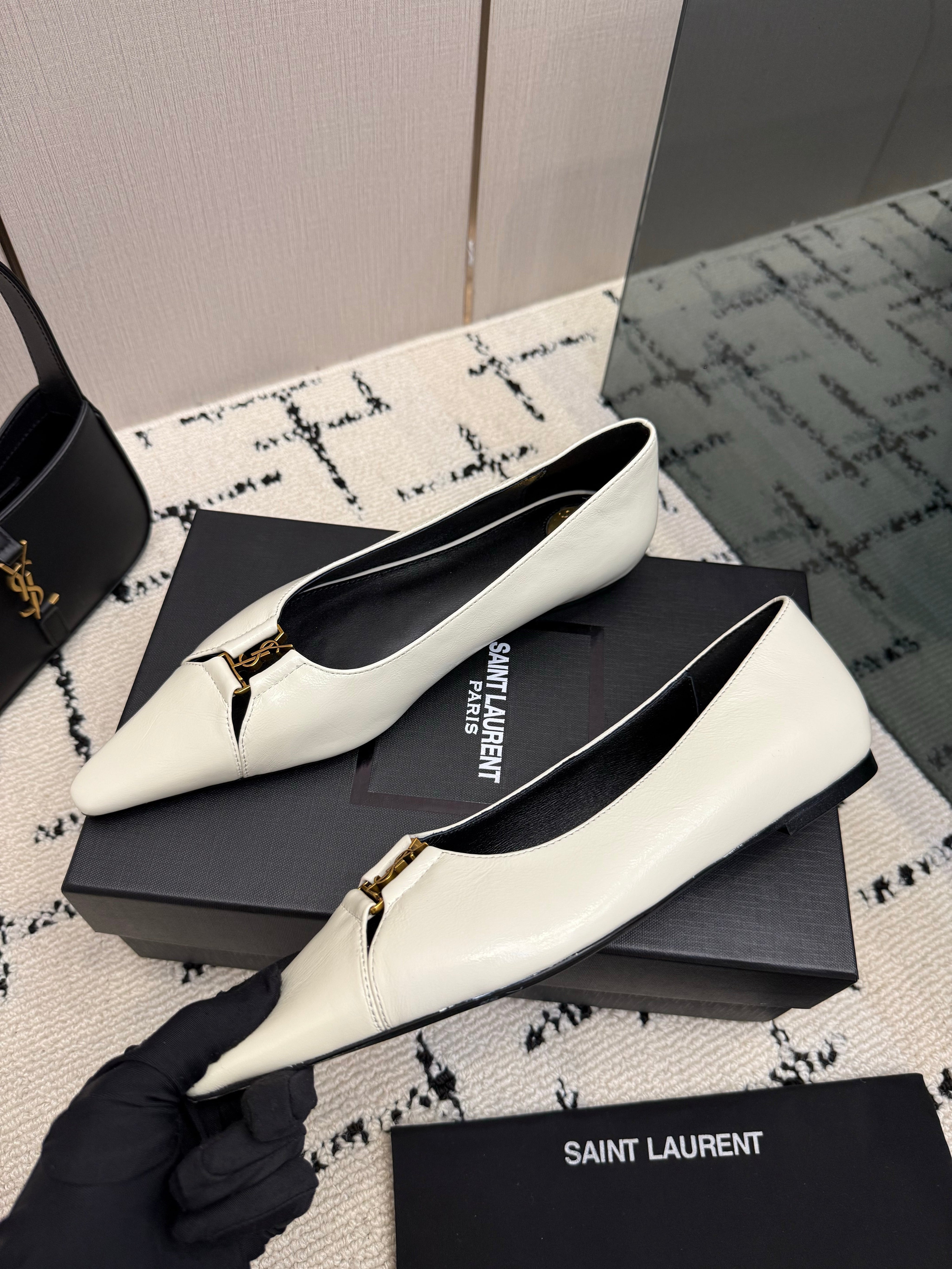 YSL 26S POINTED TOE FLATS IN WHITE CALFSKIN PATENT WITH YSL LOGO HARDWARE