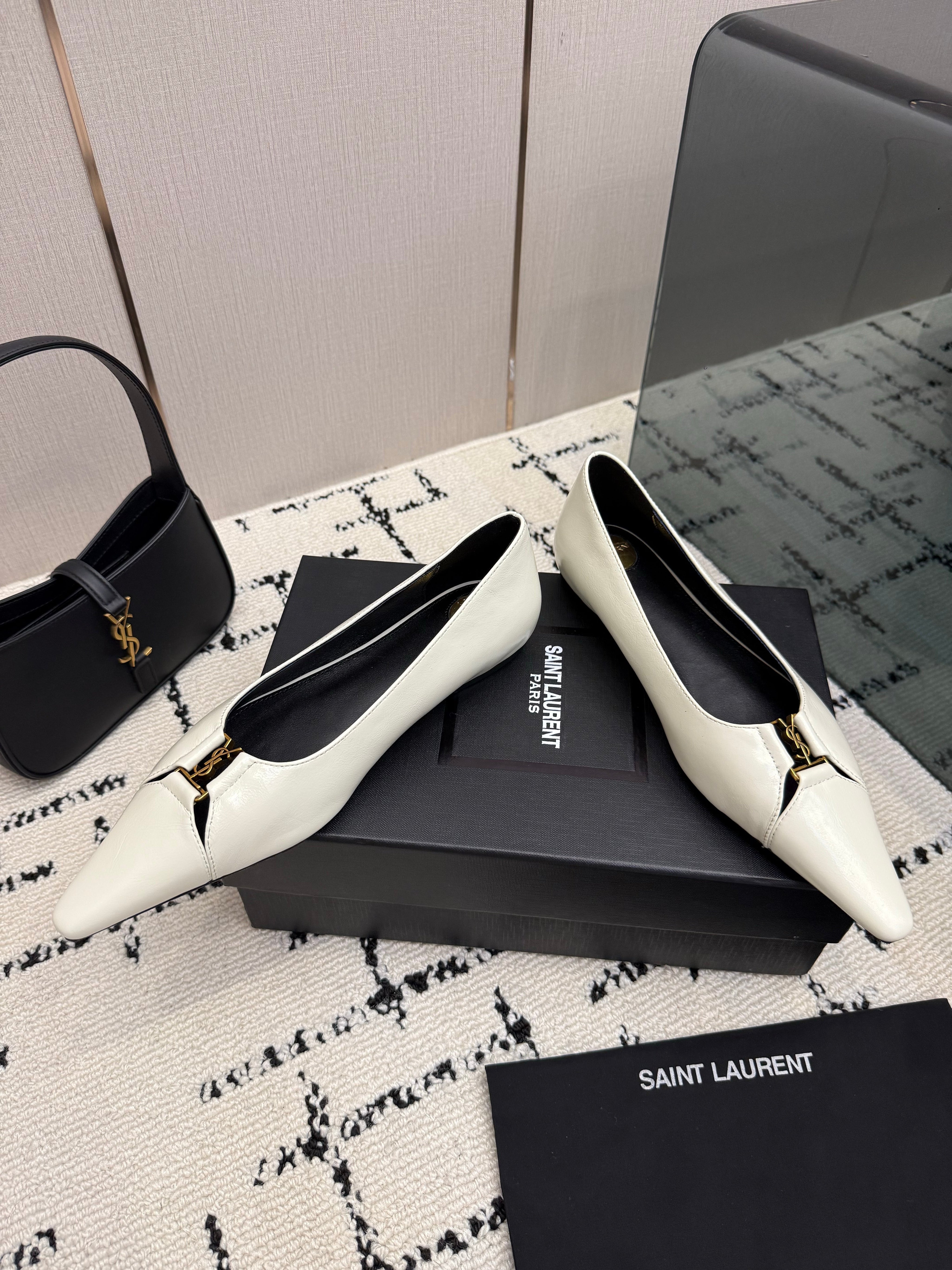 YSL 26S POINTED TOE FLATS IN WHITE CALFSKIN PATENT WITH YSL LOGO HARDWARE
