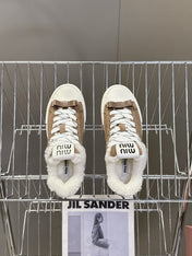 MIUMIU 25S SNEAKERS IN EARTH BROWN SUEDE WITH SHEARLING