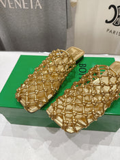 BOTTEGA VENETA 26S WOVEN MULES IN GOLD LAMBSKIN
