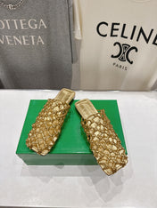 BOTTEGA VENETA 26S WOVEN MULES IN GOLD LAMBSKIN