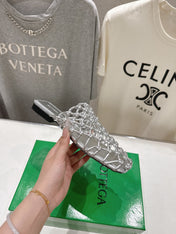 BOTTEGA VENETA 26S WOVEN MULES IN SILVER LAMBSKIN