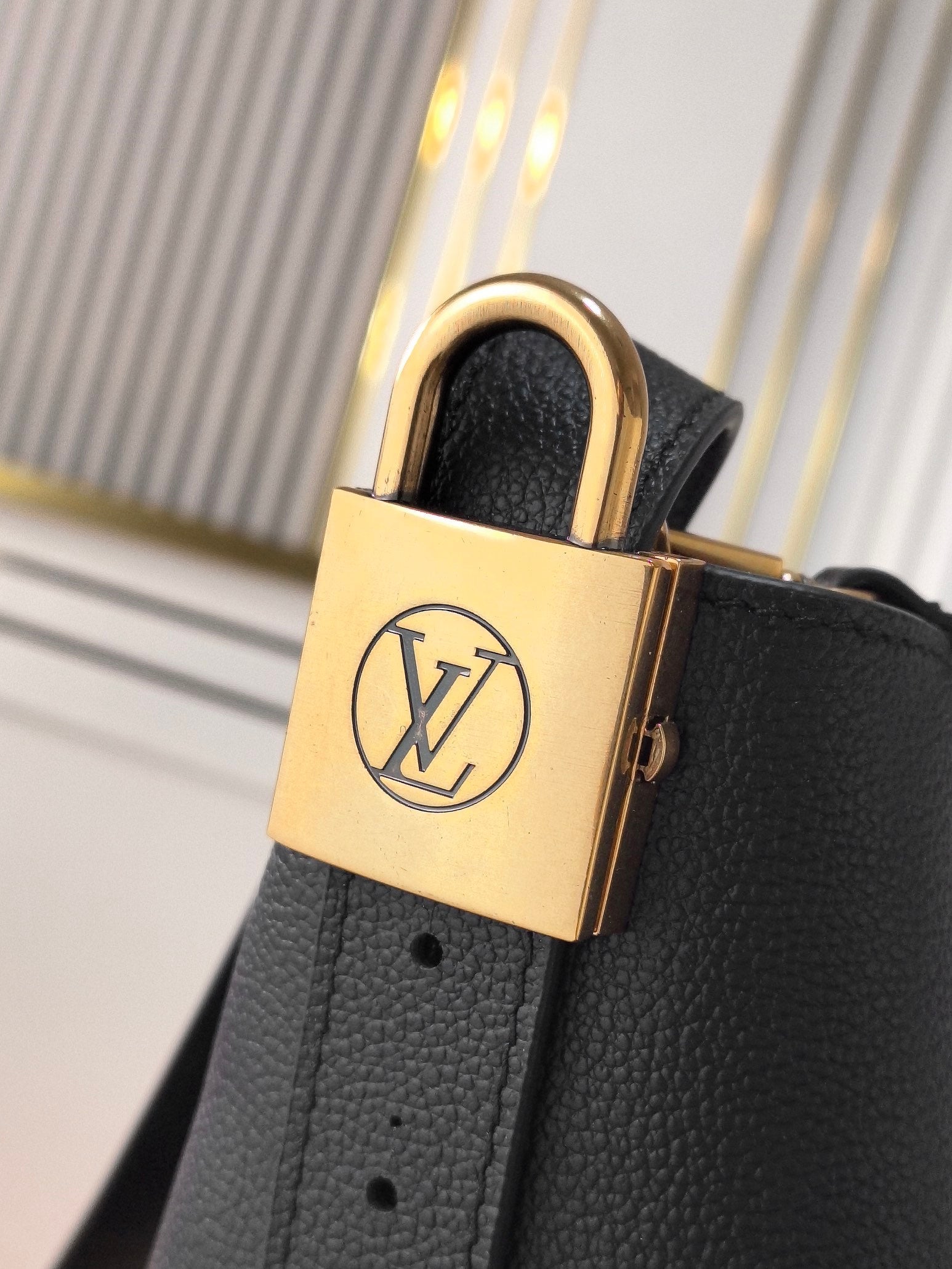 LV 25S LOW KEY ALL IN BB 18 IN BLACK CALFSKIN GOLD HARDWARE