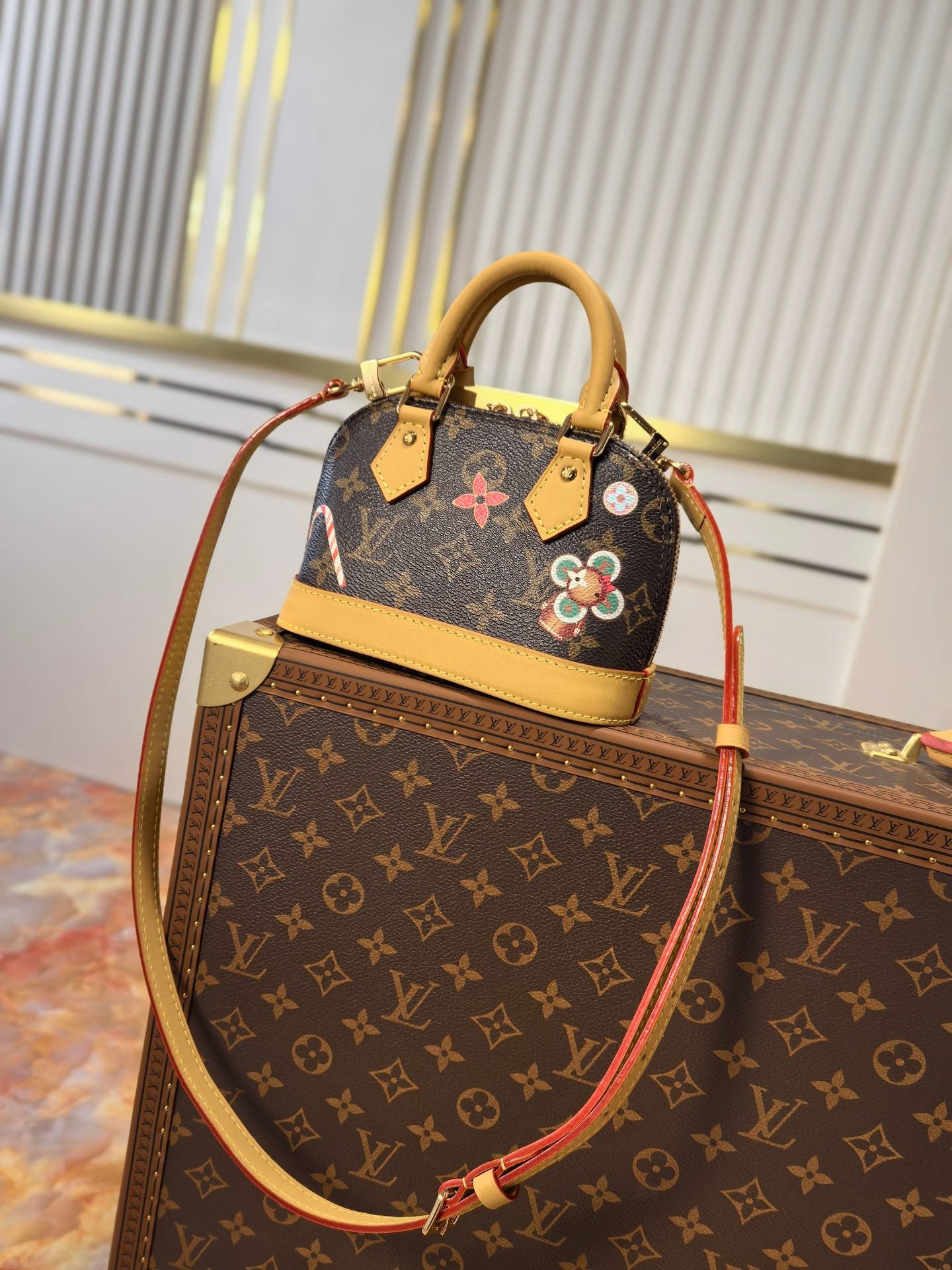 LV 25S NANO ALMA 18 IN BROWN MONOGRAM CANVAS PRINTED WITH THE VIVIENNE MASCOT