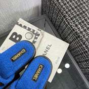 CHANEL 26S SLIDE SANDALS IN BLACK AND BLUE SHEARLING OPEN TOE