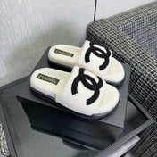 CHANEL 26S SLIDE SANDALS  IN BLACK AND WHITE SHEARLING