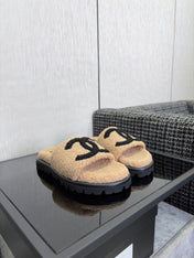 CHANEL 26S SLIDE SANDALS IN BLACK AND BEIGE SHEARLING OPEN TOE