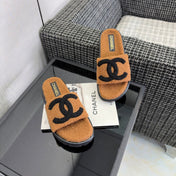 CHANEL 26S SLIDE SANDALS IN BLACK AND CAMEL SHEARLING OPEN TOE