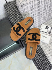 CHANEL 26S SLIDE SANDALS IN BLACK AND CAMEL SHEARLING OPEN TOE