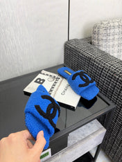 CHANEL 26S SLIDE SANDALS IN BLACK AND BLUE SHEARLING SQUARE TOE