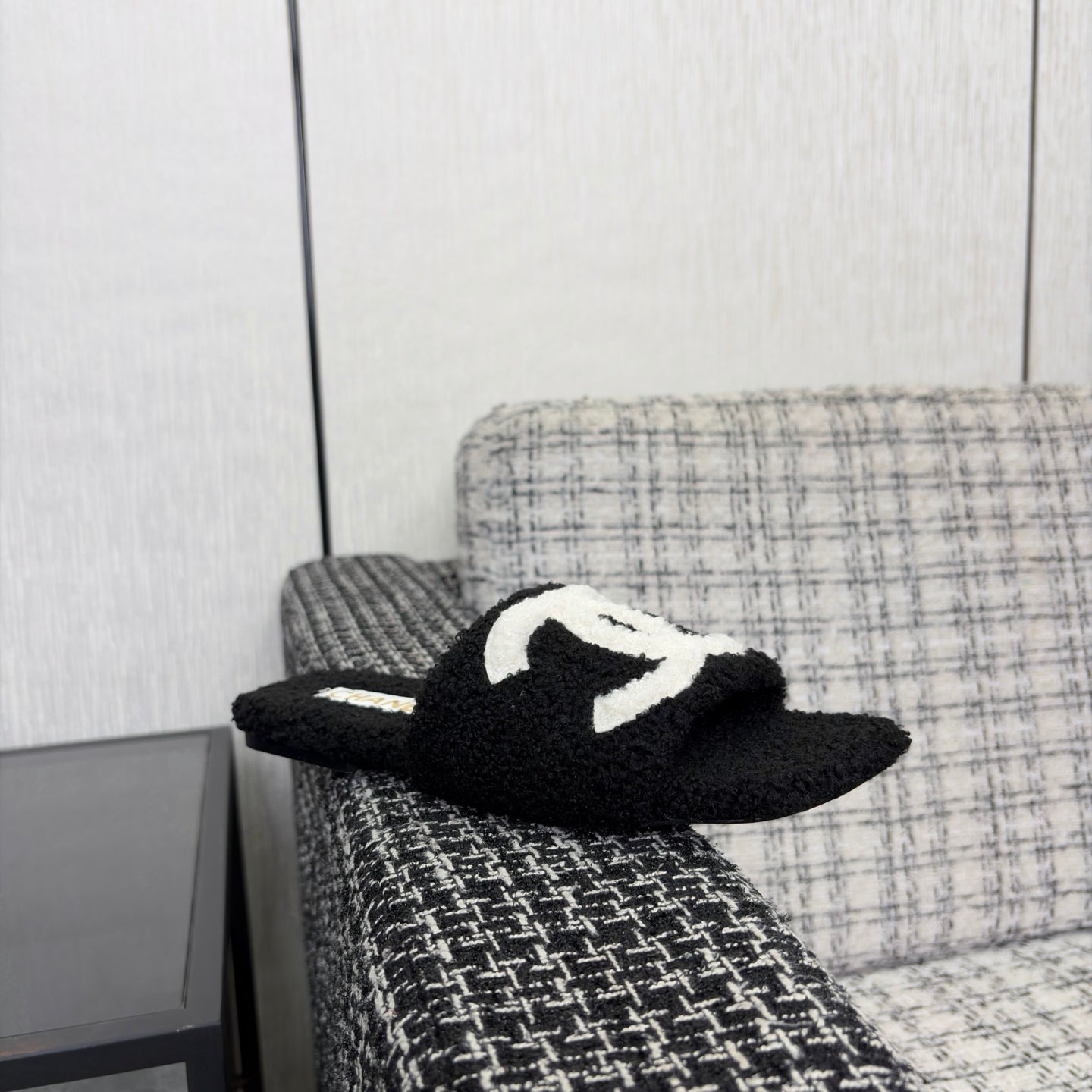 CHANEL 26S SLIDE SANDALS IN BLACK SHEARLING AND WHITE CC LOGO SQUARE TOE
