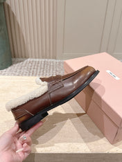 MIUMIU 25S PENNY LOAFERS 20MM IN EBONY BROWN BLEACHED CALFSKIN WITH SHEARLING