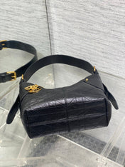 DIOR 25S SMALL VOYAGE BAG 23 IN BLACK FLAT MACROCANNAGE GRAINED GLOSSY CALFSKIN