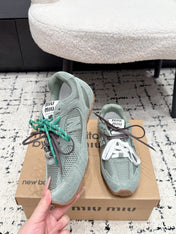 MIUMIU 26S SNEAKERS IN LIGHT BLUE SUEDE SUEDE AND MESH FABRIC