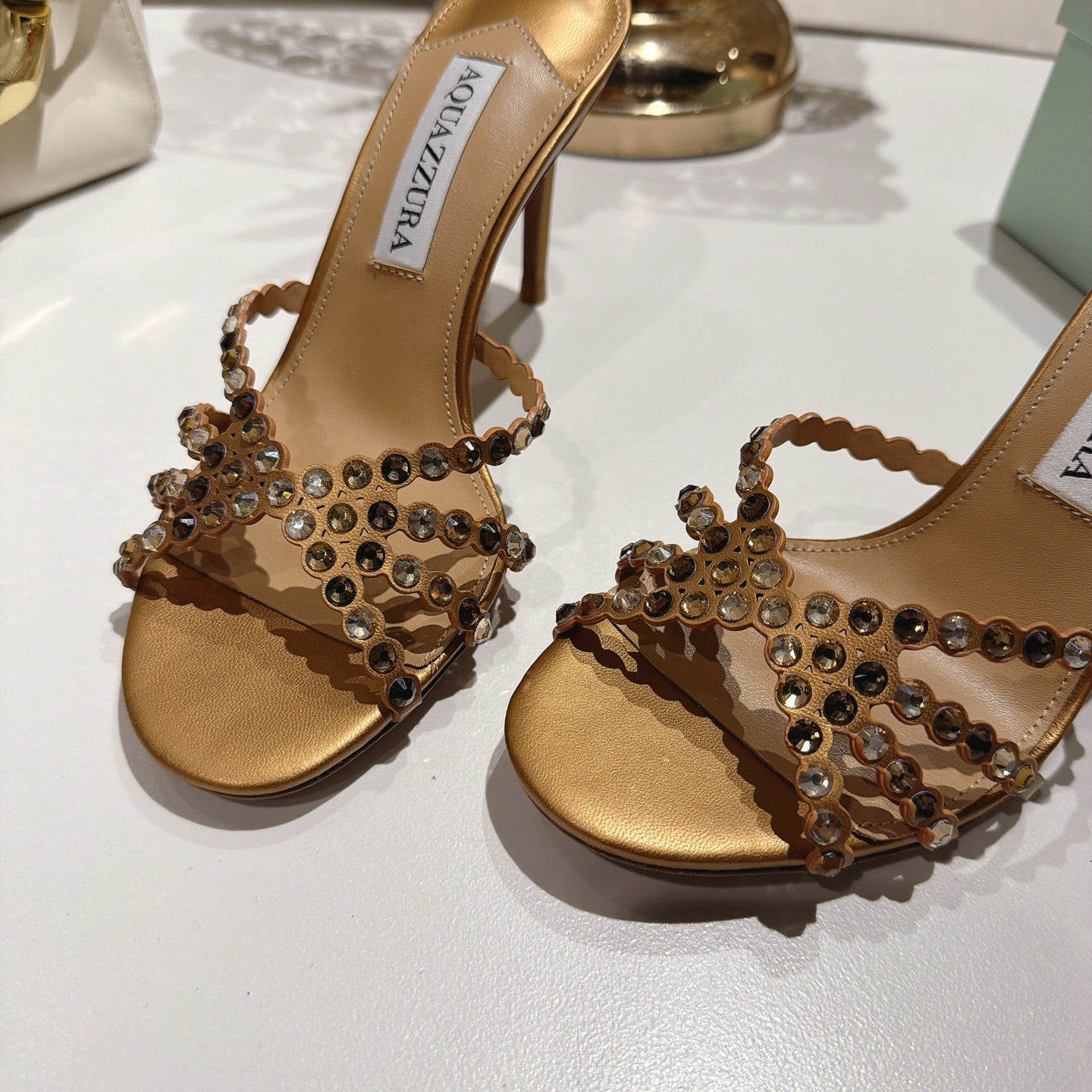 AQUAZZURA 26S HIGH-HEEL SANDALS 85 MM IN METALLIC GOLD CALFSKIN